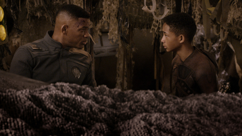 Will Smith (left) and Jaden Smith star in After Earth, an unfortunately humorless film.