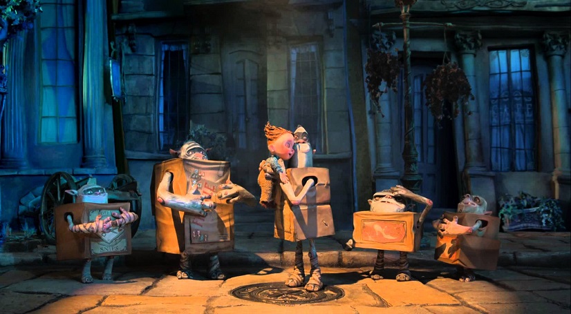 The Boxtrolls | Graham Annable & Anthony Stacchi The Boxtrolls movie scene: A boy with trolls wearing cardboard boxes in a town setting. Stop-motion animation.