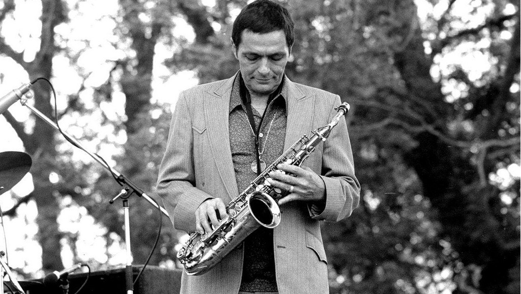 Art Pepper, jazz saxophonist, with his saxophone. Smack Up album. Black and white photo.