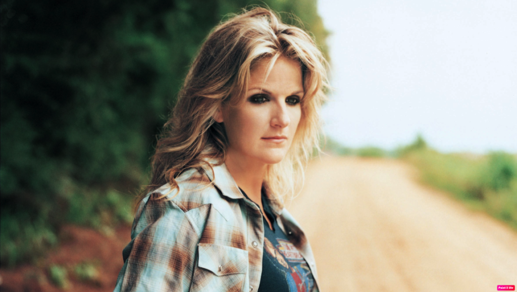 Trisha Yearwood, Hearts in Armor album art. Country music singer in plaid shirt on a rural road.