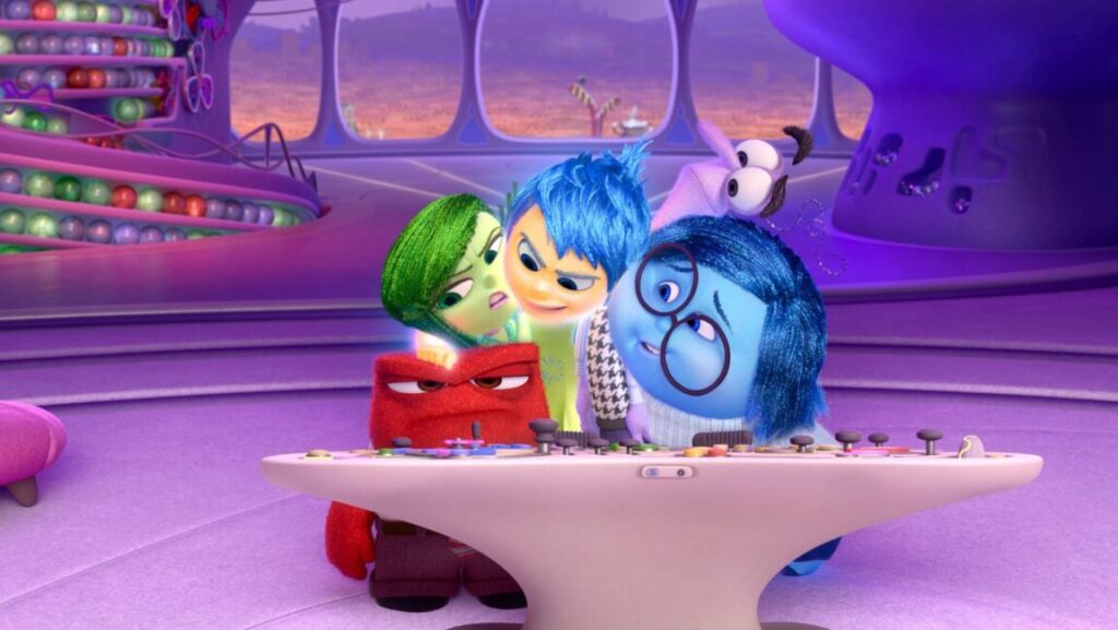 Inside Out | Pete Docter, Renaldo Del Carmen Inside Out movie scene featuring Joy, Sadness, Anger, Fear, and Disgust at the control panel.
