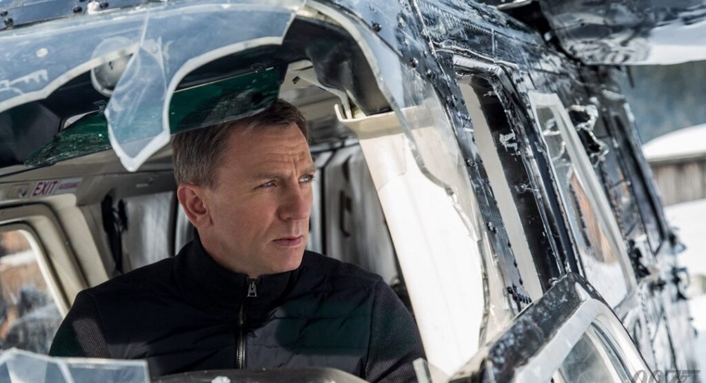 Spectre | Sam Mendes Daniel Craig as James Bond in Spectre (2015). Damaged helicopter.
