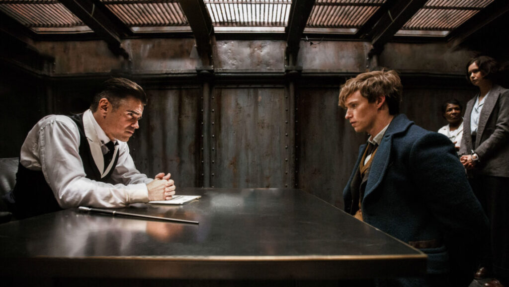 Fantastic Beasts and Where to Find Them | David Yates Fantastic Beasts: Newt Scamander (Eddie Redmayne) faces Percival Graves (Colin Farrell) in a tense scene.