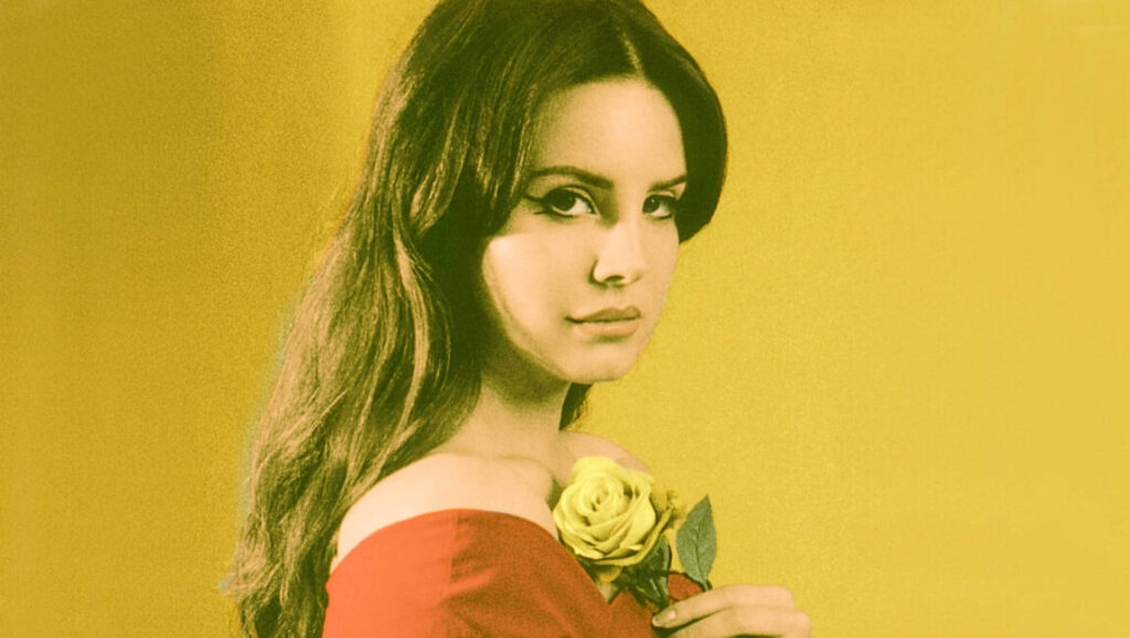 Lana Del Rey, one of the top album artists of 2017, holding a yellow rose. Music albums of the year.