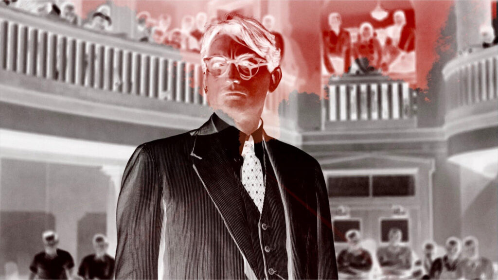 New York Film Festival 2017 film still. Man in suit with audience.