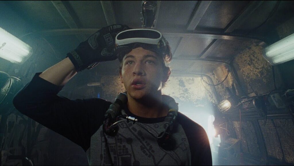 Ready Player One movie still. Tye Sheridan as Parzival with VR headset. Steven Spielberg film.