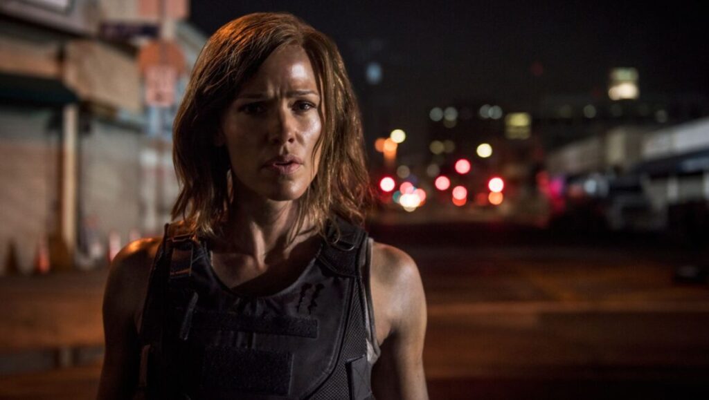 Peppermint | Pierre Morel Jennifer Garner in Peppermint movie. Action scene with a determined look. Pierre Morel film.