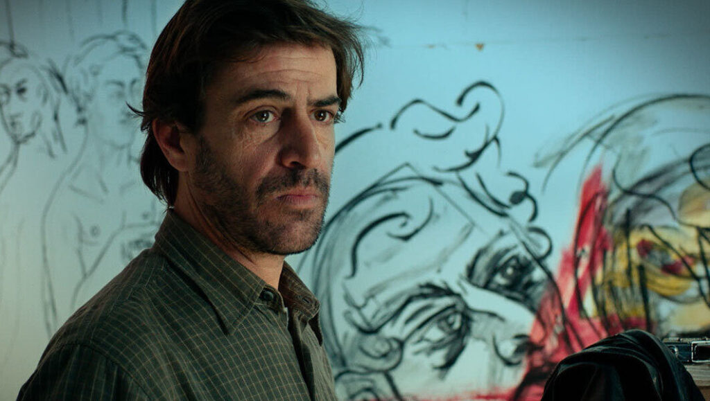 Man at Toronto International Film Festival (TIFF) 2018. Artist with drawings.