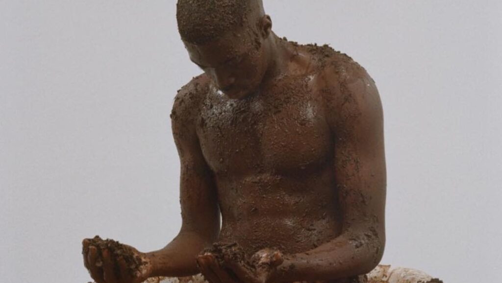 What Would Meek Do? Issue 3: Man covered in mud. Artistic expression.