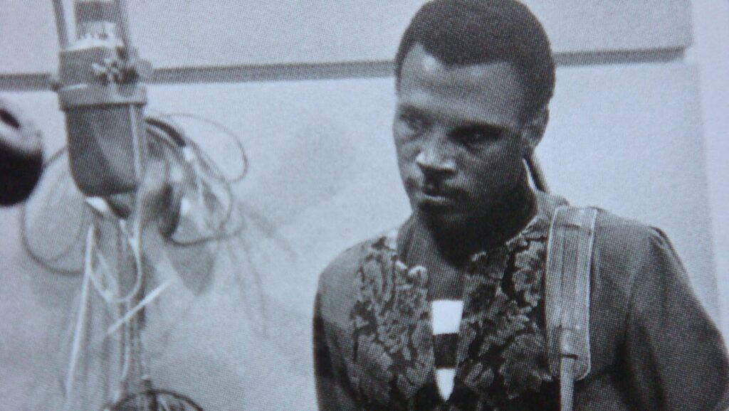 Magic Sam West Side Soul album cover. Blues musician with guitar and microphone.