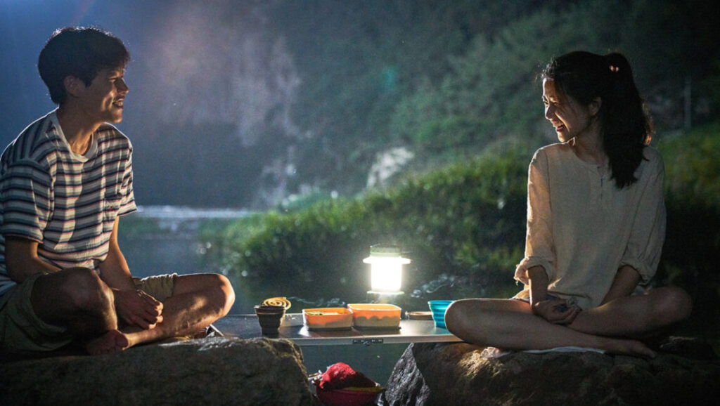 Little Forest movie scene: Kim Tae-ri and Ryu Jun-yeol at night. Korean film, Yim Soon-rye direction.
