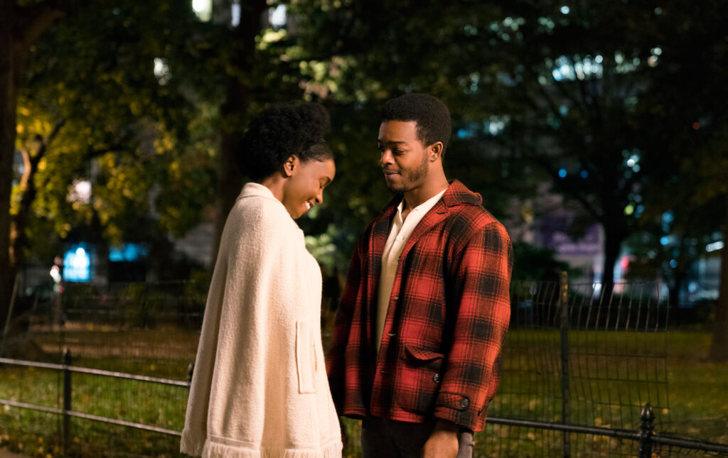 If Beale Street Could Talk movie image: KiKi Layne and Stephan James in a romantic scene.