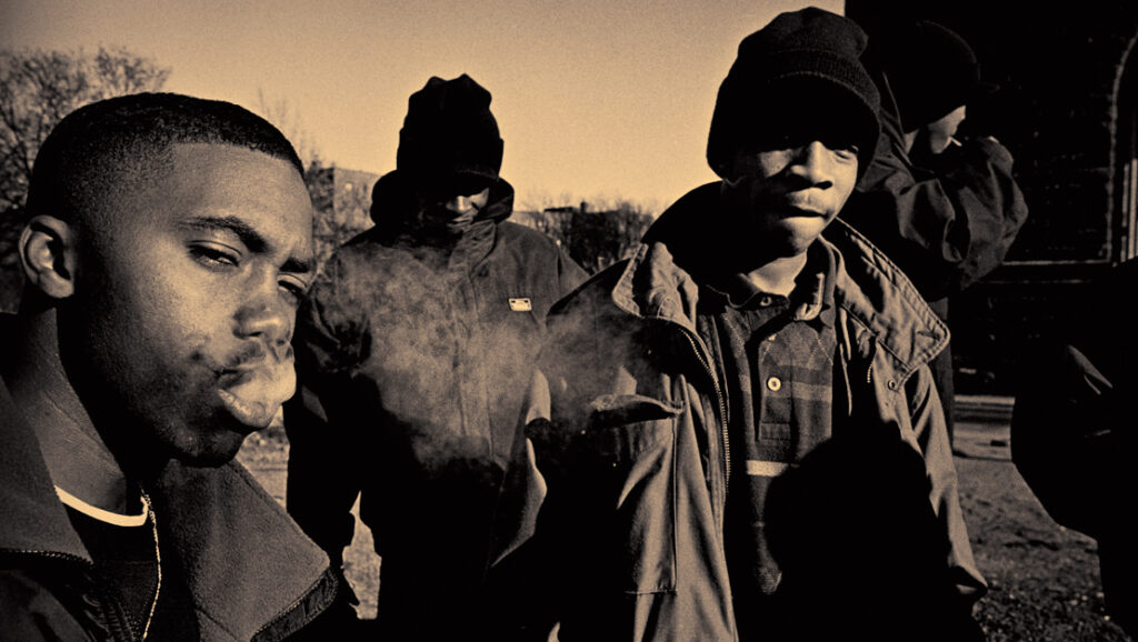 Nas | Illmatic Nas, the rapper, with a group of men smoking. Image related to the album *Illmatic*.