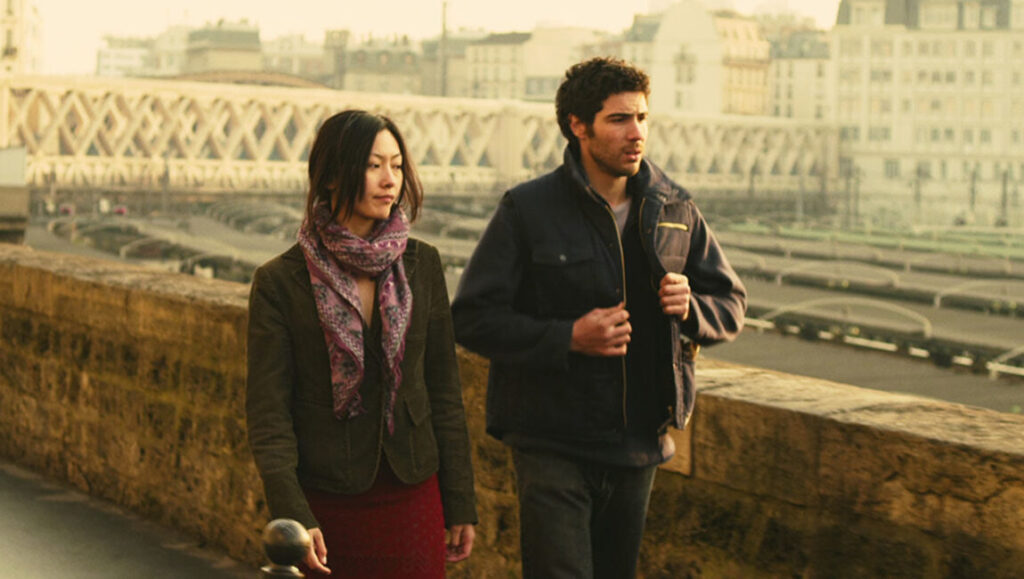 Love and Bruises | Lou Ye Love and Bruises film still: Coralie Trinh Thi and Tahar Rahim walk in Paris. Lou Ye retrospective.