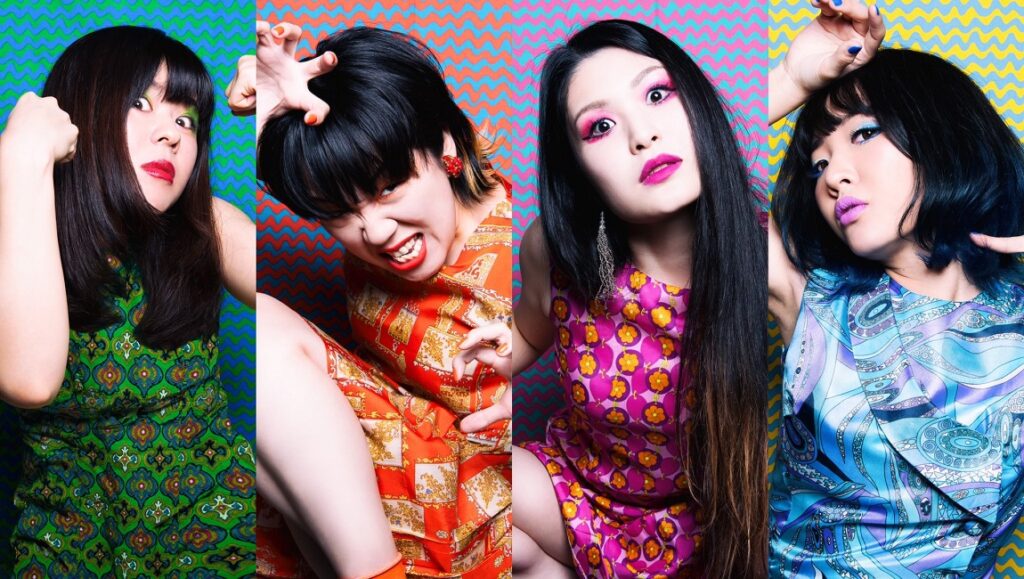 Otoboke Beaver | Itekoma Hits Otoboke Beaver's Itekoma Hits album art. Japanese punk band in retro dresses and bold makeup. Colorful, vibrant.