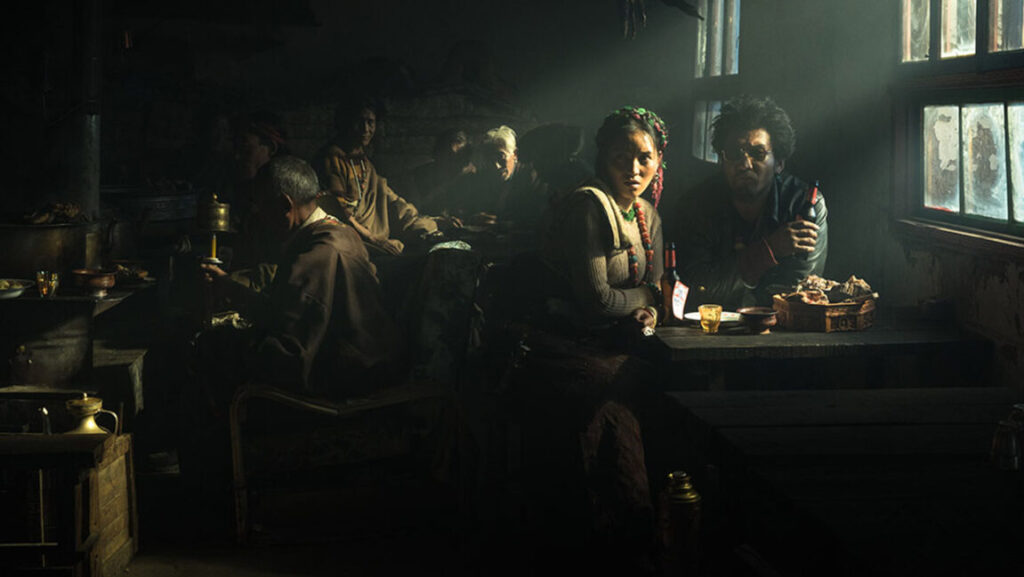 Mr. Long film scene: Sabu and others sit in a dimly lit room, light streaming through a window. #MrLong #Sabu #MovieScene