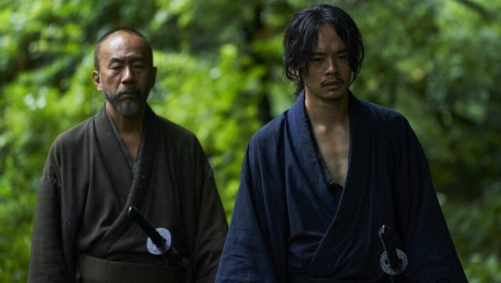 Killing movie scene: Two samurai warriors stand in a forest. Japanese film.