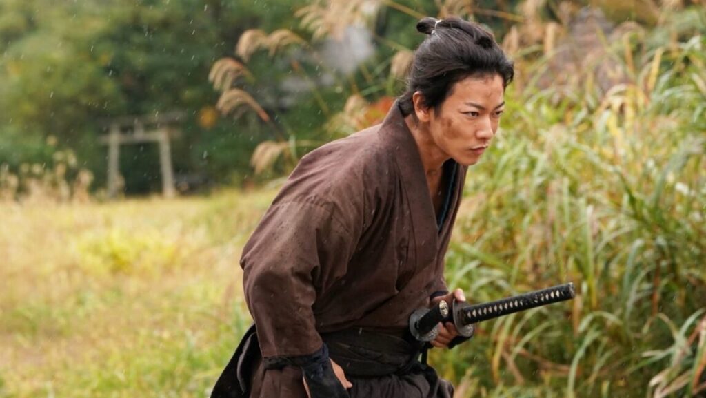 Japanese samurai warrior with katana sword in field. Bushido code. Martial arts.