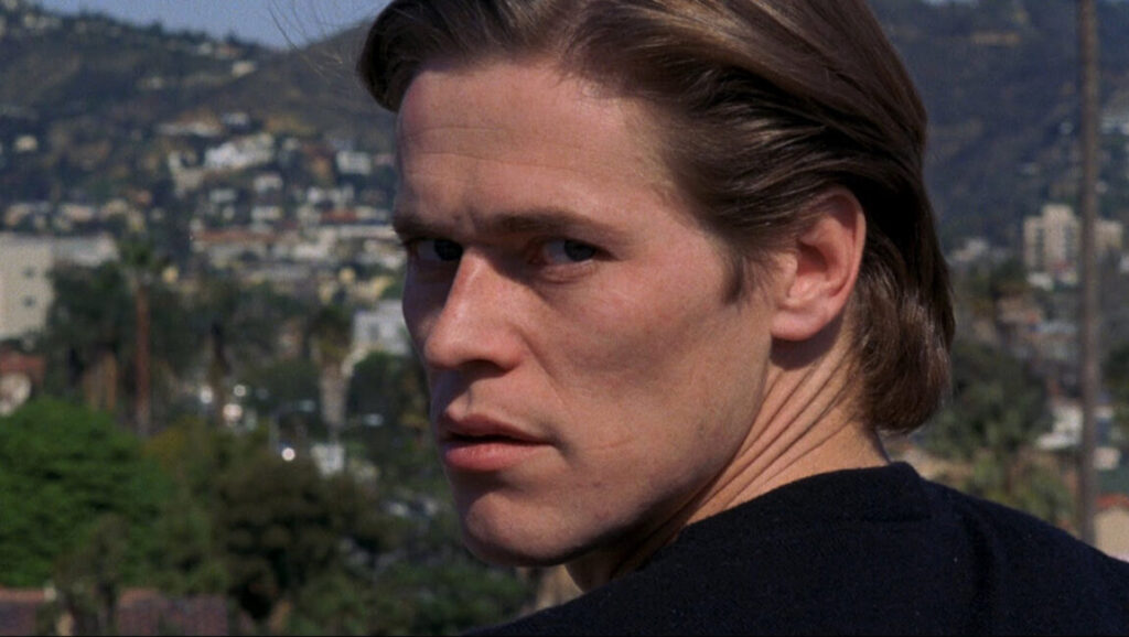 Willem Dafoe in To Live and Die in L.A. (1985). William Friedkin film. Movie still.