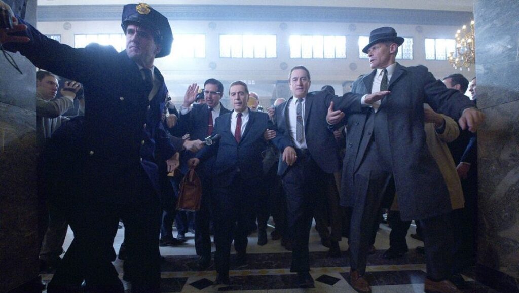 The Irishman film scene. Robert De Niro and Joe Pesci escorted by police, New York Film Festival 2019.