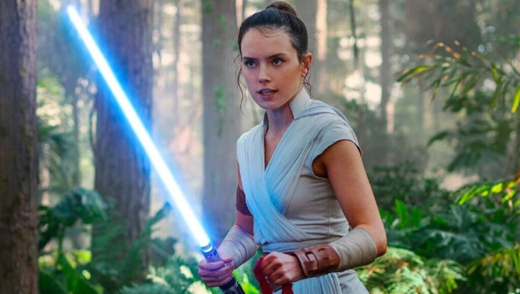 Star Wars: The Rise of Skywalker | J. J. Abrams Daisy Ridley as Rey Skywalker with lightsaber. Star Wars character.