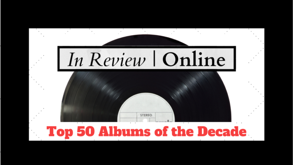 In Review | Online text over a vinyl record. Top 50 Albums of the Decade text below.