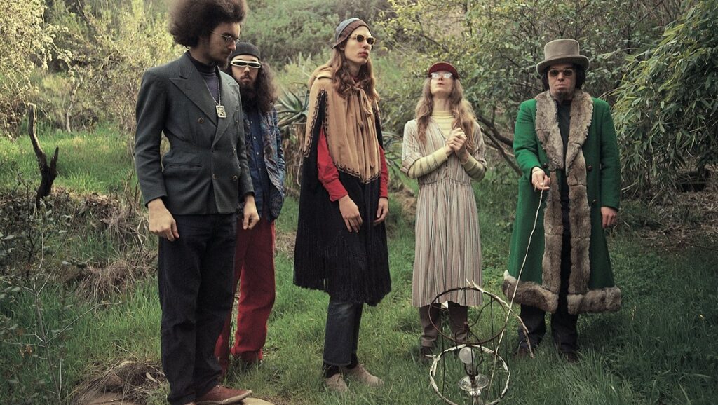 Captain Beefheart and His Magic Band, Safe as Milk era. Band members in eccentric outfits in a field.