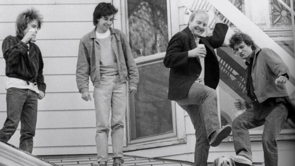 The Replacements band, Let It Be era. Black and white shot of the band on a roof. Paul Westerberg.