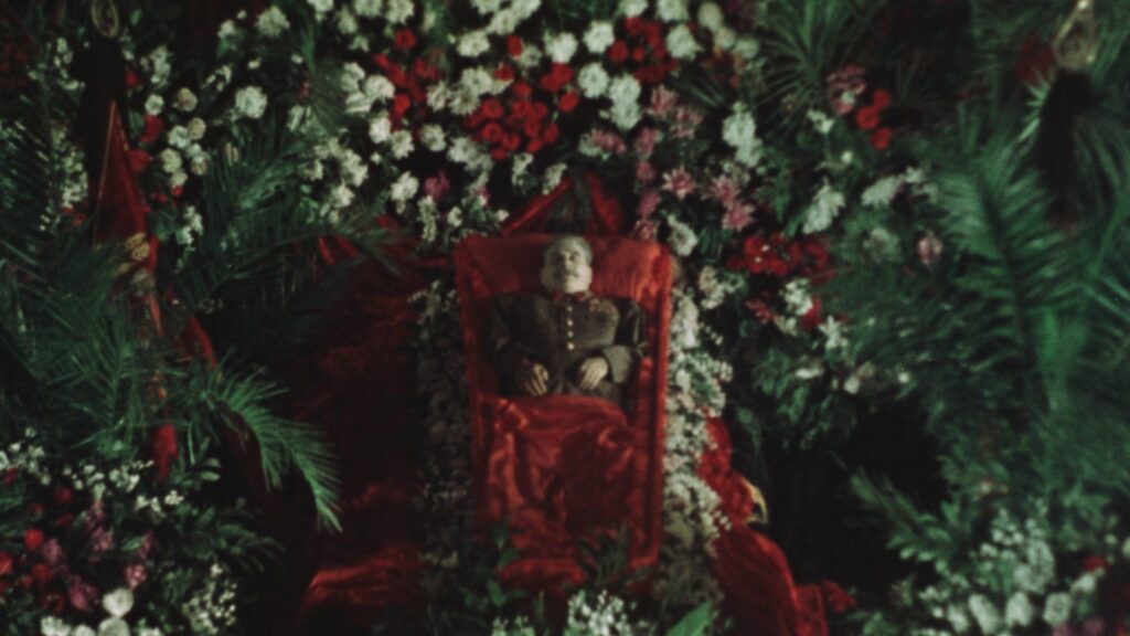 State Funeral film still from Portland Film Festival. Stalin lying in state surrounded by flowers.