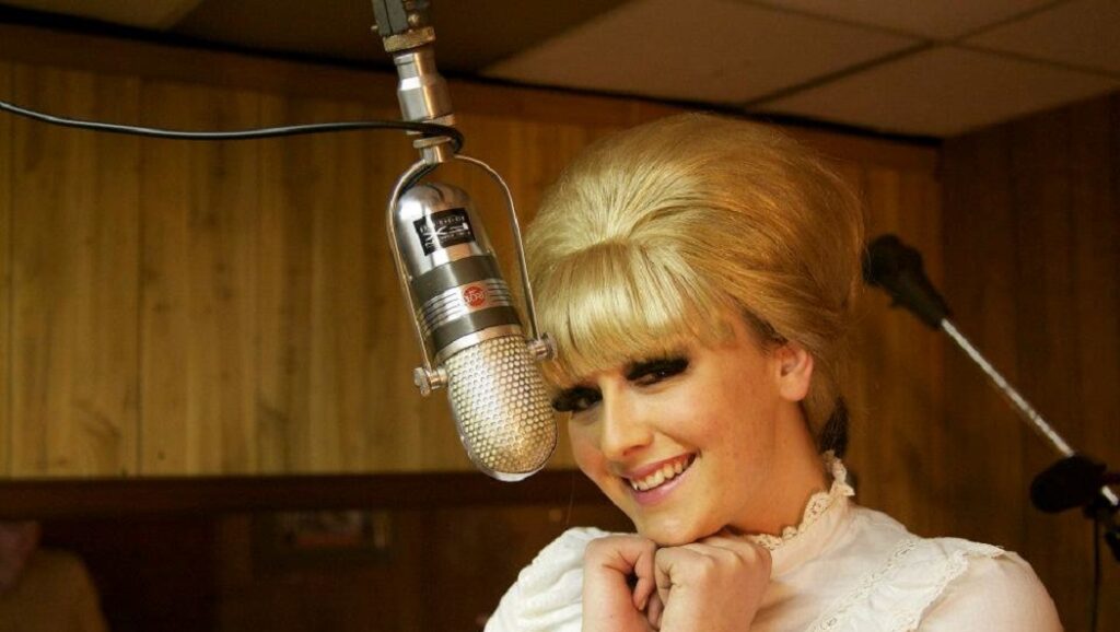 Dusty Springfield in Memphis. Singer with blonde beehive hairstyle at microphone in recording studio.