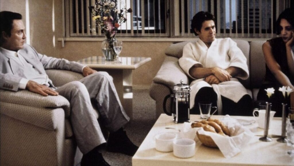 New Rose Hotel scene by Abel Ferrara. Features Christopher Walken, Willem Dafoe, and Asia Argento in a hotel room.