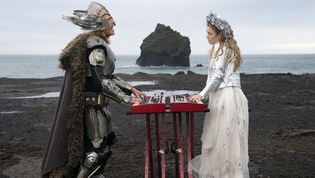 Eurovision Song Contest: The Story of Fire Saga | David Dobkin Eurovision Song Contest: The Story of Fire Saga. Performers on black sand beach with keyboards and Viking costume.