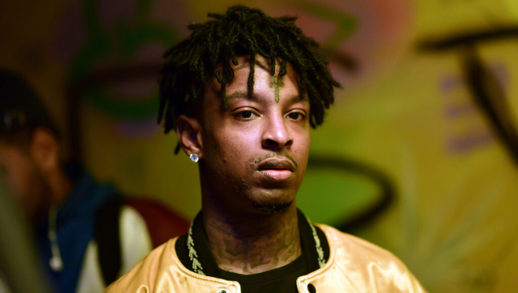 21 Savage | I Am > I Was 21 Savage, I Am > I Was album art. Rapper with dreadlocks and tattoos.