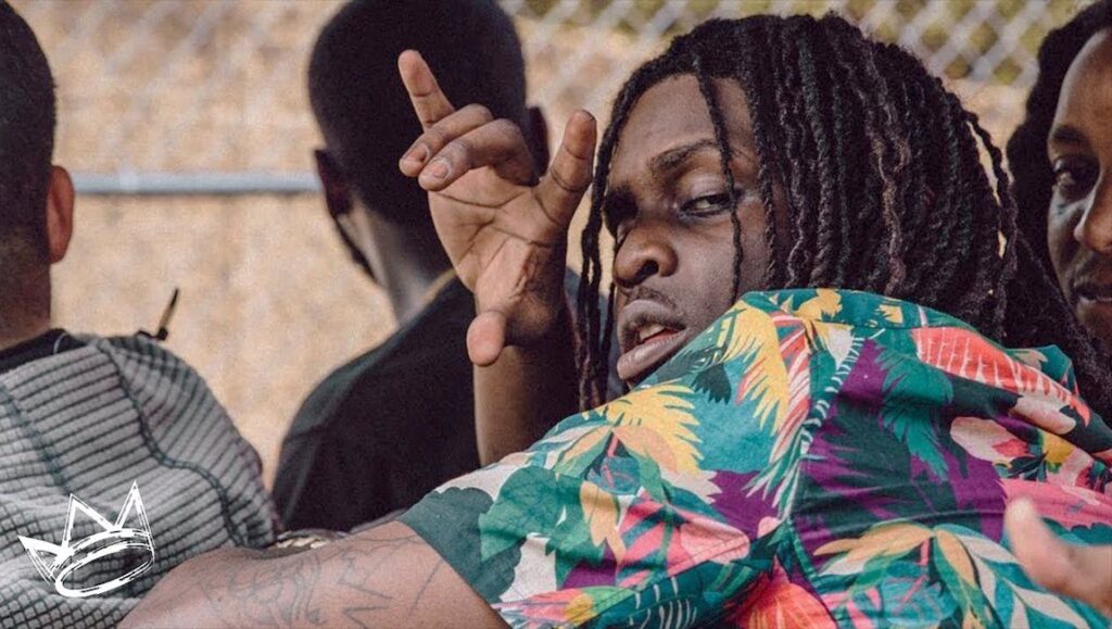 Chief Keef | The Cozart Chief Keef, The Cozart. Rapper with dreadlocks wearing a colorful shirt. Music artist.