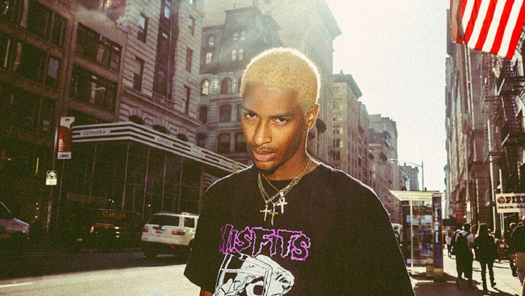 Comethazine | Bawskee Comethazine in New York City. Rapper with blonde hair, wearing a Misfits t-shirt and cross necklaces. Bawskee album promo.