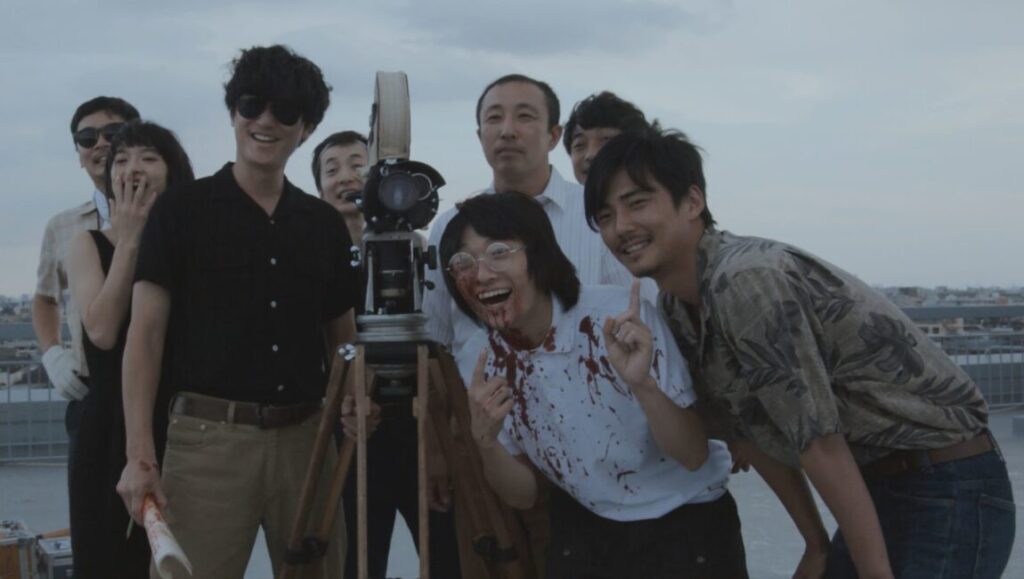 Dare to Stop Us film cast and crew. Kazuya Shiraishi film. Japanese film crew with vintage camera.