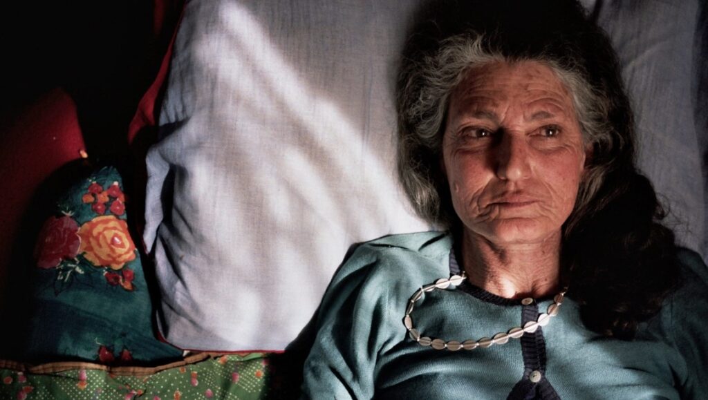 The Disappearance of My Mother film still. Elderly woman lying in bed. Beniamino Barrese documentary.