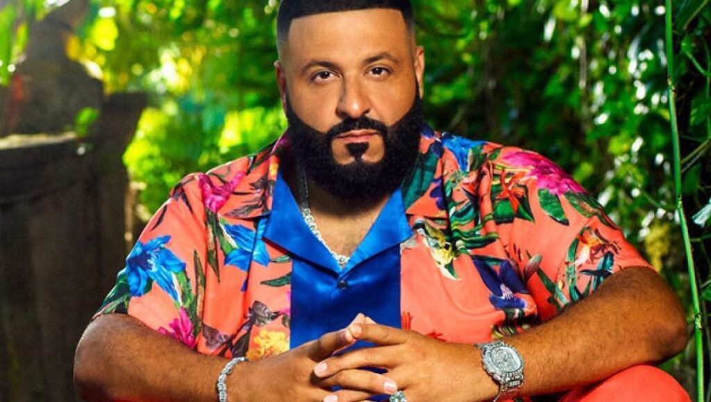 DJ Khaled, Father of Asahd album art. Rapper in floral shirt with jewelry.