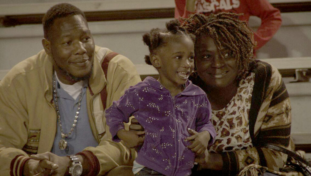 Life and Nothing More film still. Family portrait of a father, mother, and child.