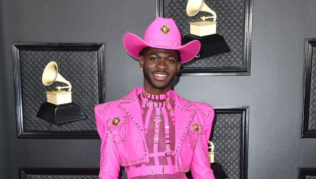 Lil Nas X in pink cowboy outfit. The 7 singer at the Grammys.