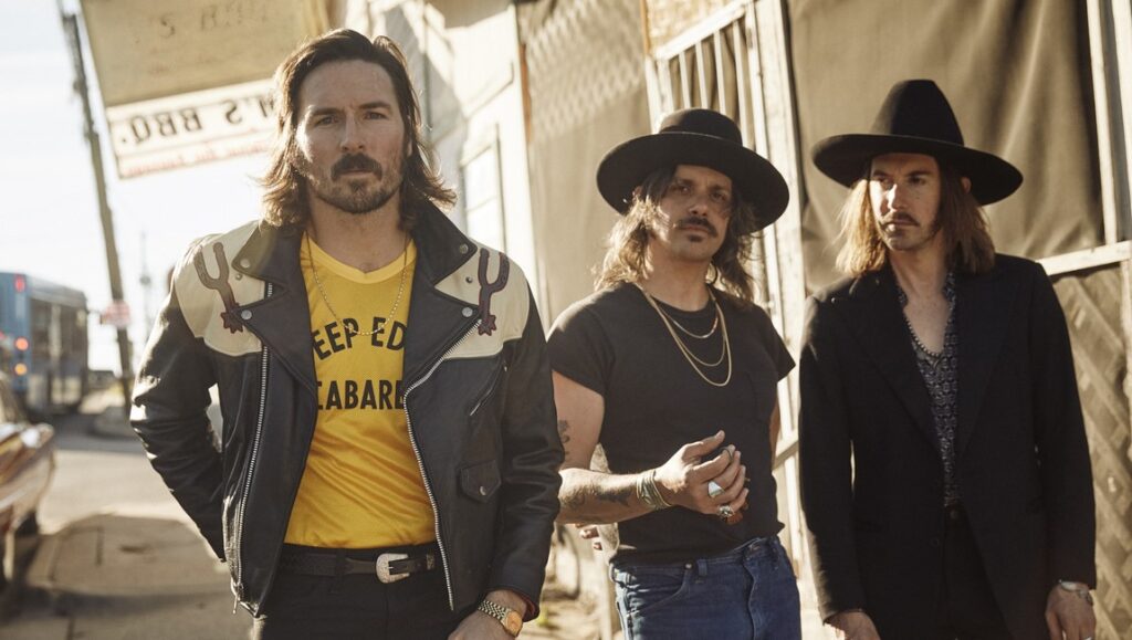 Midland | Let It Roll Midland band members promote Let It Roll album. Country music group in hats and vintage fashion.