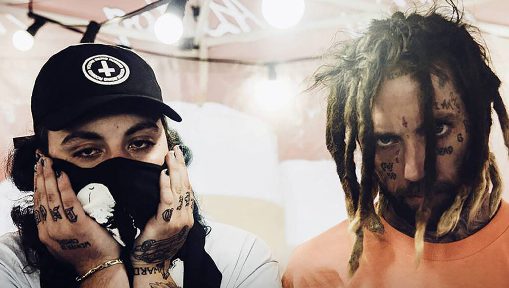 Suicideboys | I Want to Die in New Orleans Suicideboys I Want to Die in New Orleans album art. Ruby da Cherry and $crim portrait. Tattoos, dreadlocks, and streetwear.