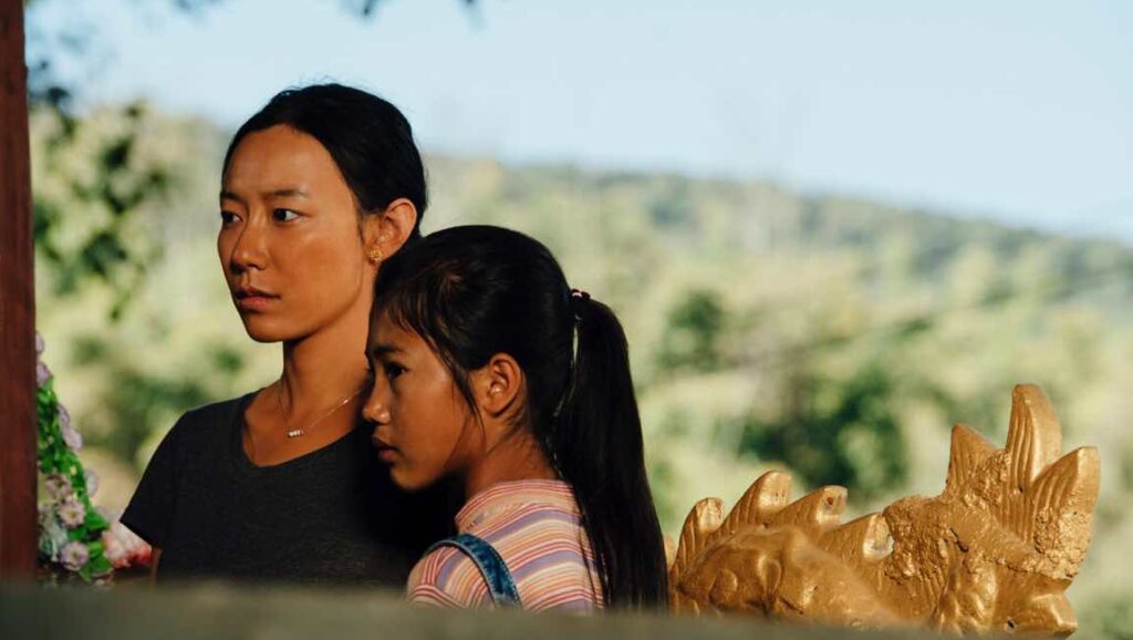 The Taste of Rice Flower | Peng Fei Song Peng Fei Song's The Taste of Rice Flower: Woman and child, possibly mother and daughter, looking thoughtful.