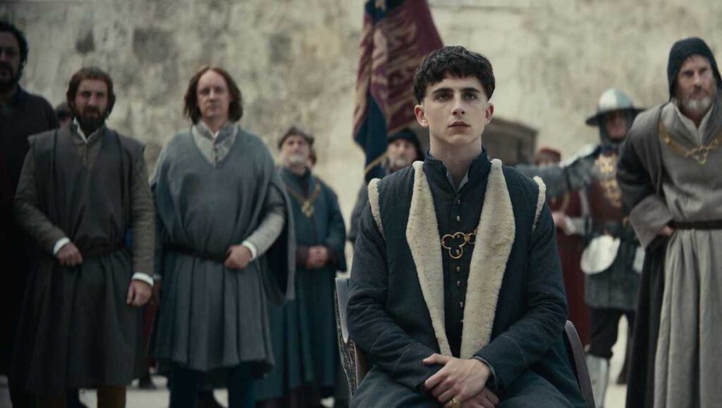 The King | David Michôd Timothée Chalamet in The King movie. Hal is surrounded by his court. Medieval drama.