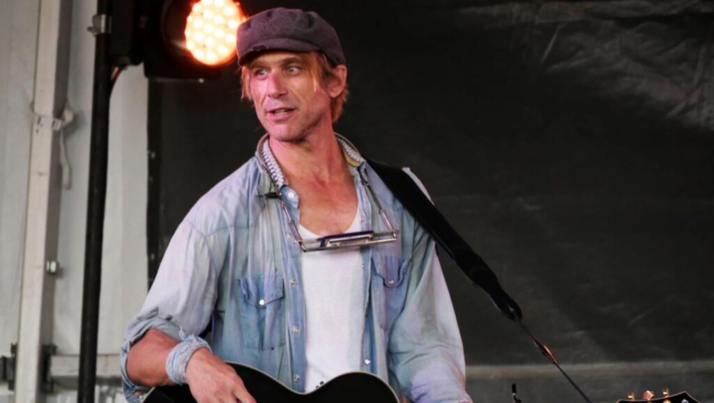 Todd Snider, Cash Cabin Sessions, Vol. 3 album art. Musician with guitar and harmonica.