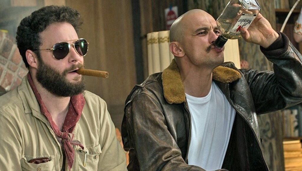 Zeroville | James Franco James Franco in Zeroville movie. Franco drinking from a bottle, and Seth Rogen smoking a cigar.