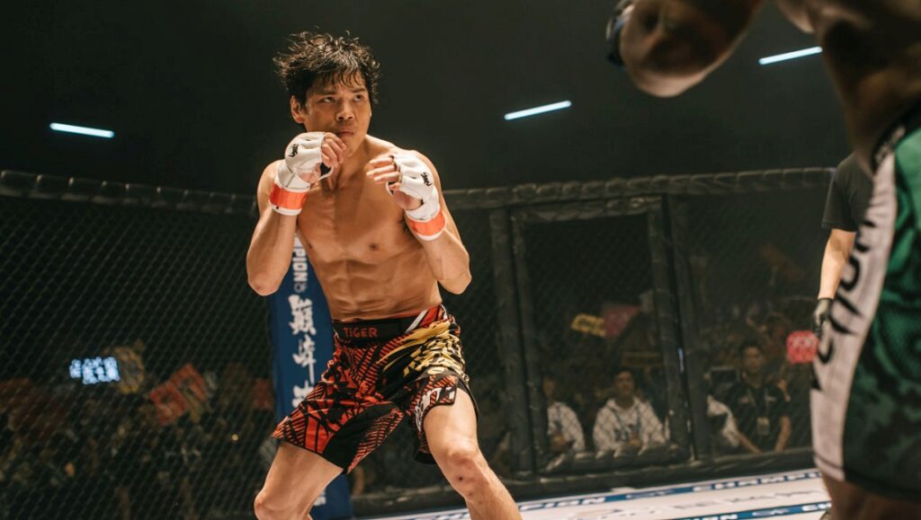 Chasing Dream film still from Fantasia Fest 2020. Boxer in fighting stance. MMA, martial arts.