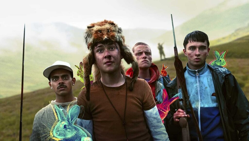 Get Duked! | Ninian Doff Get Duked! movie still. Four boys in the Scottish Highlands, one wearing a fox hat, surreal rabbits.