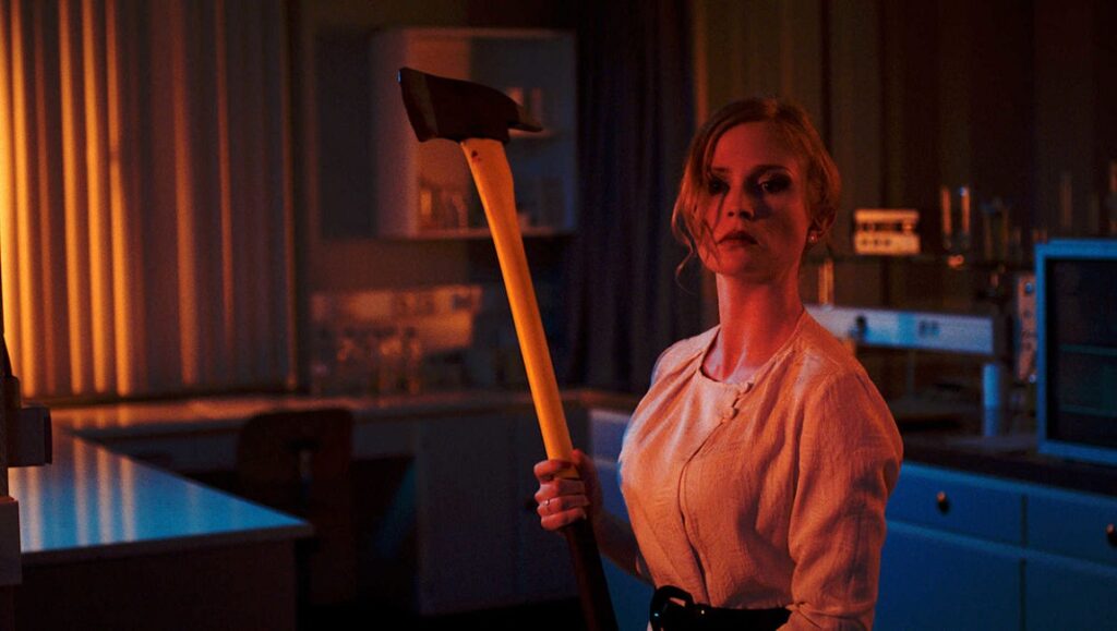 Yummy | Lars Damoiseaux Yummy: Woman holds axe. Horror film. Lars Damoiseaux movie. Thriller.