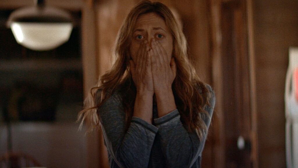 Fantasia Fest 2020 – Dispatch 5: The Dark & the Wicked, I WeirDo, PVT CHAT Mariana Treviño in The Dark & the Wicked at Fantasia Fest 2020. Woman with hands covering her mouth. Horror movie.